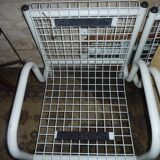 pair of iron armchairs