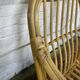 Fauteuil chauffeuse vintage en rotin des années 70