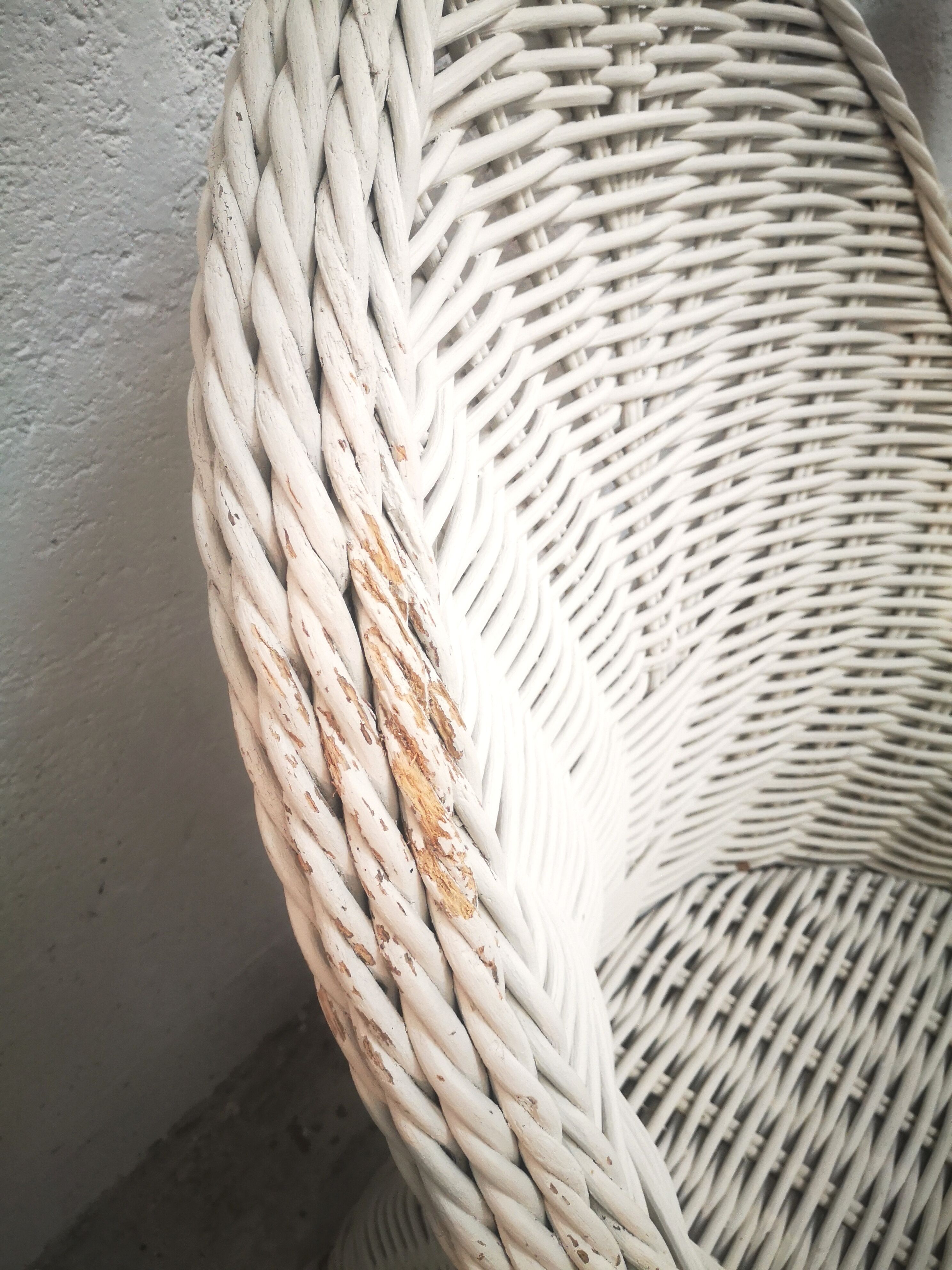 Pair of white rattan armchairs