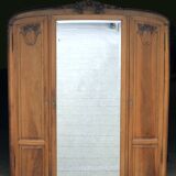 Majestic solid walnut wardrobe. Stamped work, late 19th century.
