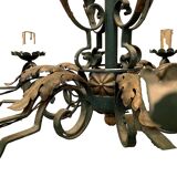 Louis XV style chandelier in wrought and hammered iron 20th century