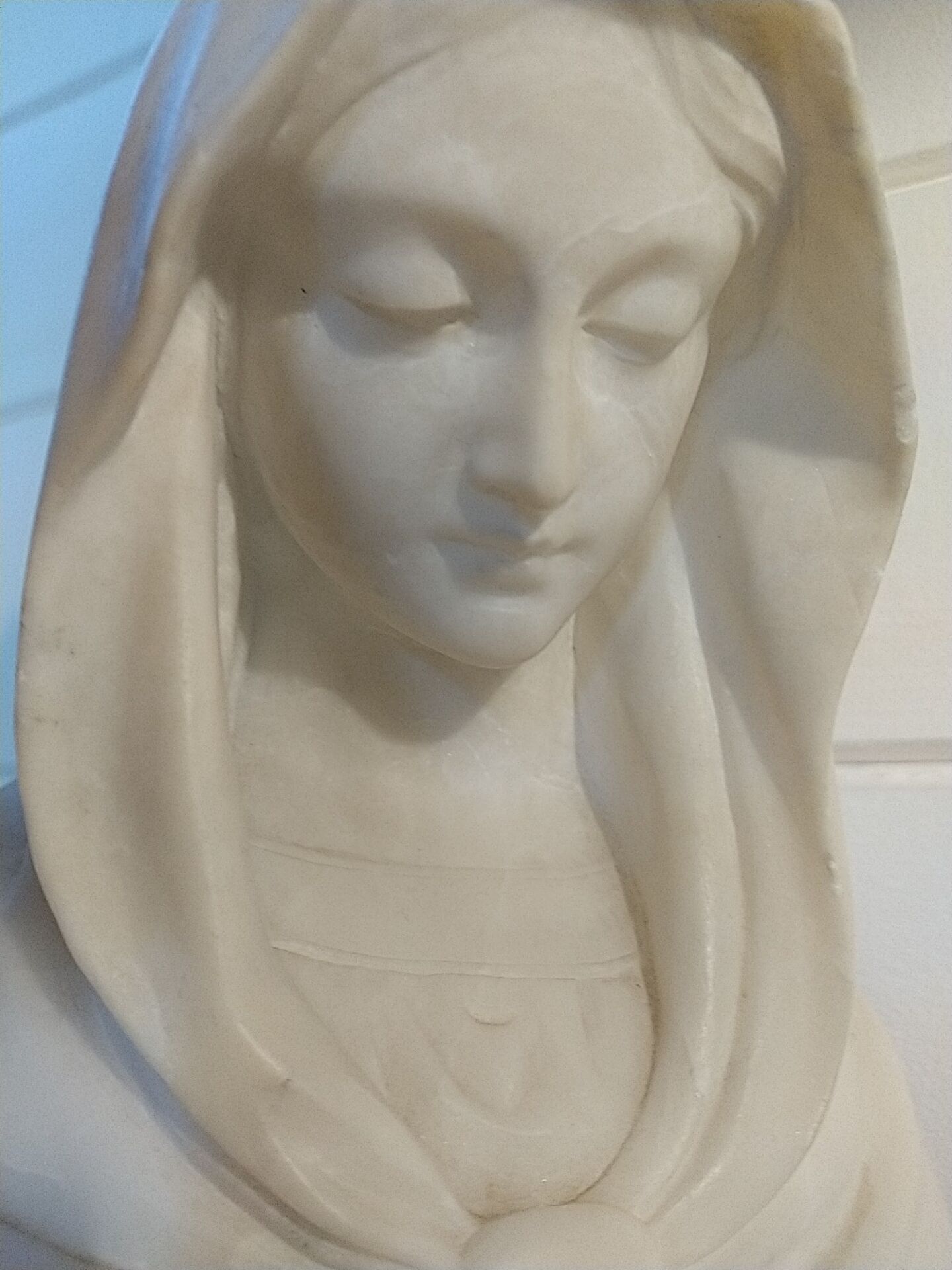 Bust of the Virgin in alabaster by Guglielmo Pugi.