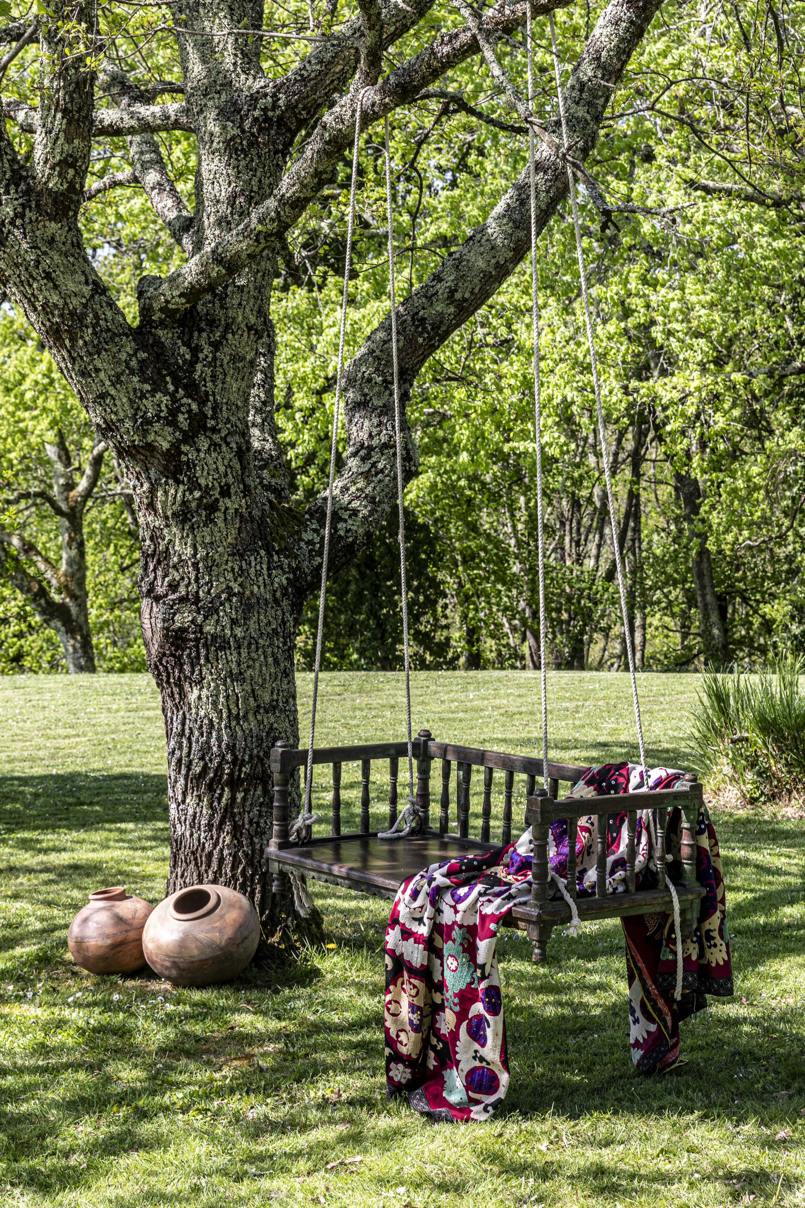 Black lacquered teak rocking chair