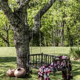 Black lacquered teak rocking chair