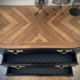 Black patinated commodity