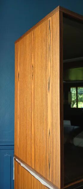 Enfilade wall vitrine in veneered teak from the 1960s.