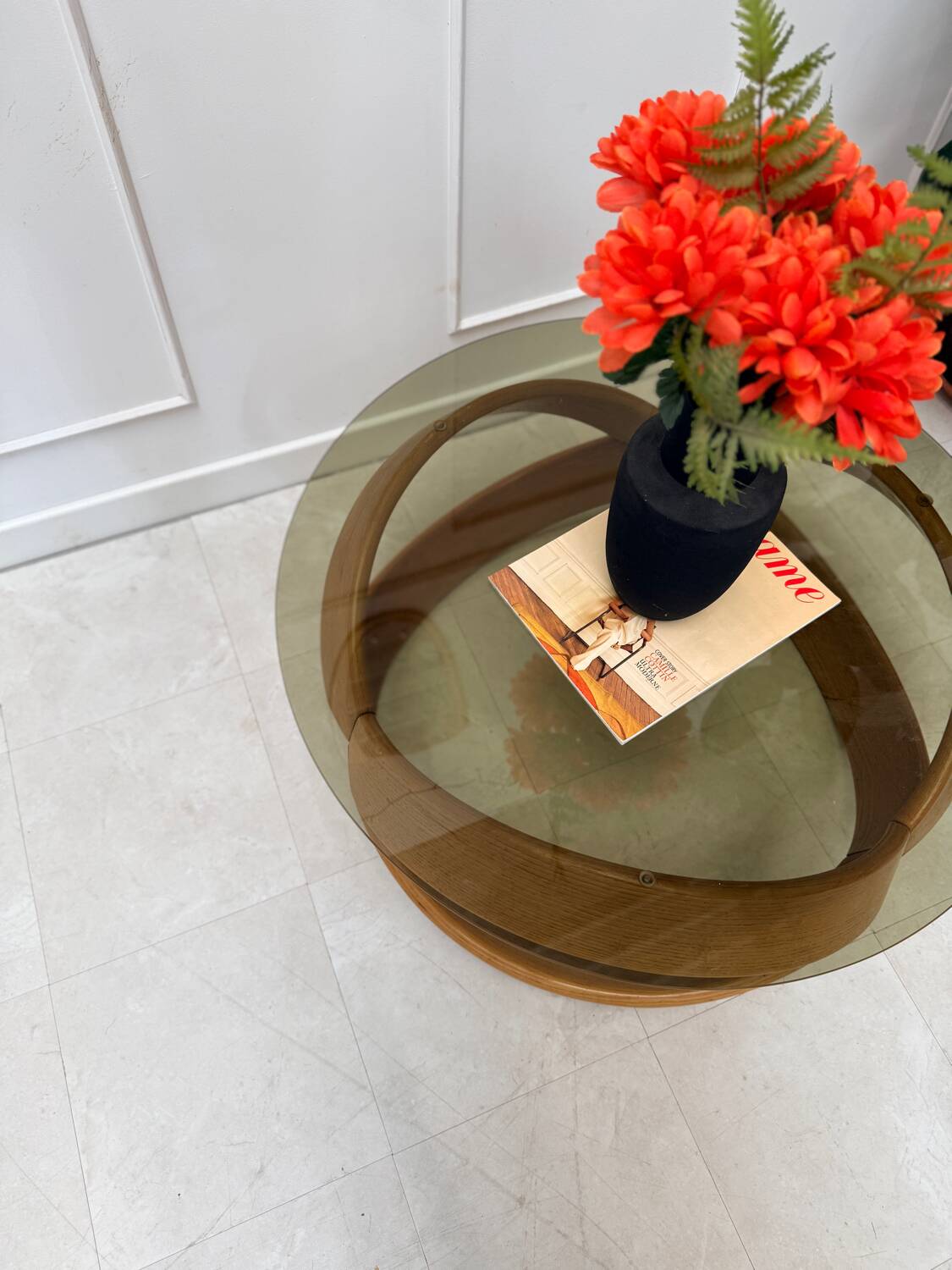 Smoked glass and curved wood coffee table