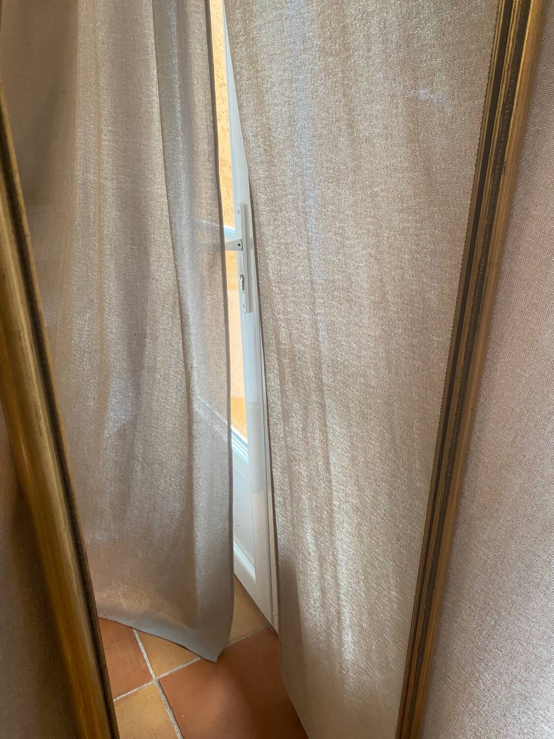 Large and old wooden mirror