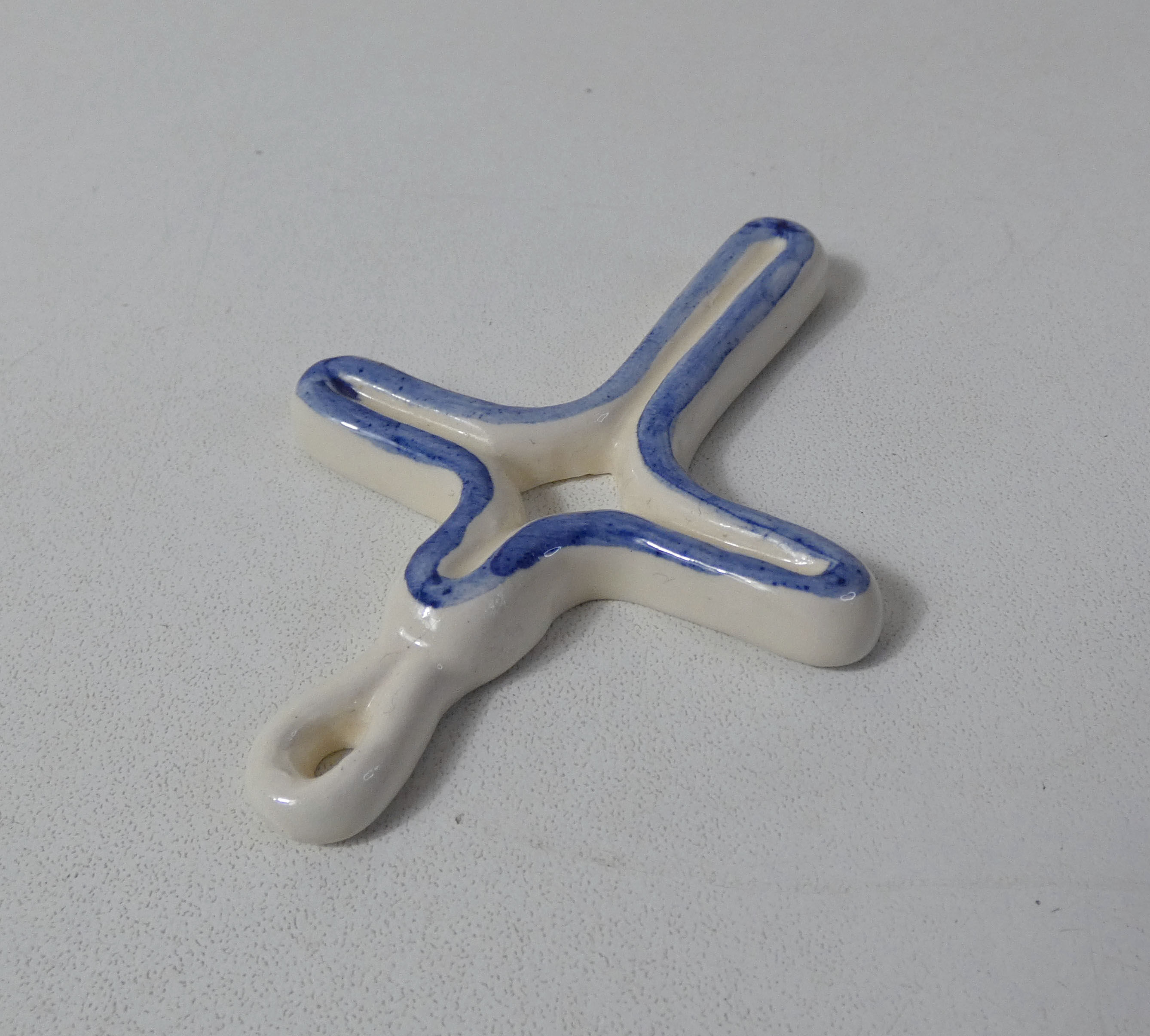 Quimper cross signed BK