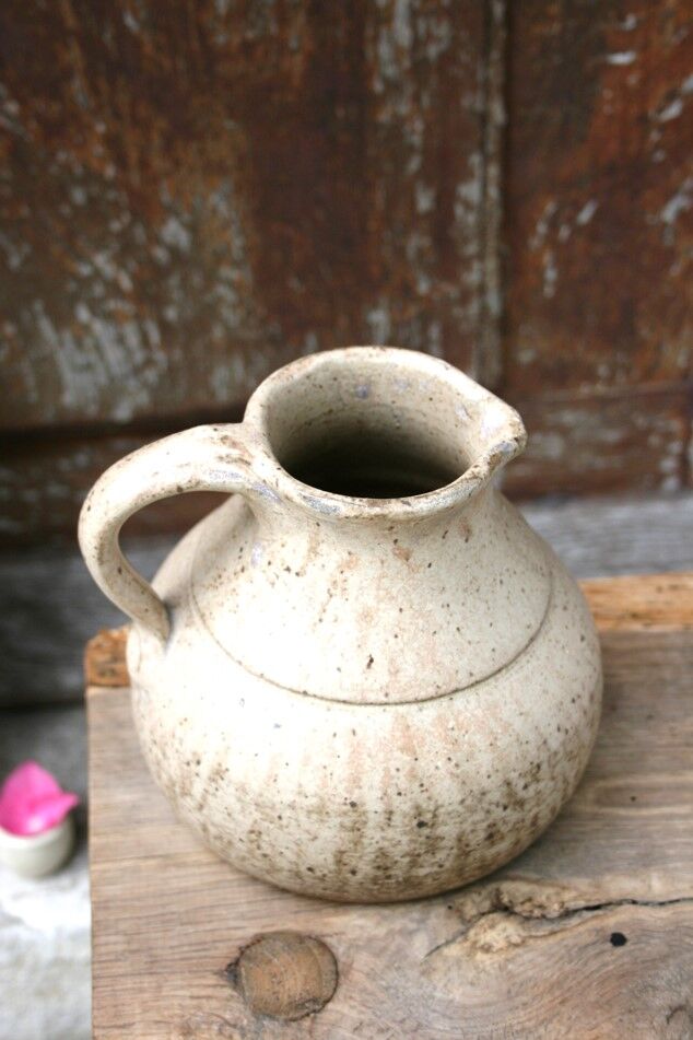 Old jug/pitcher in terracotta-sandstone