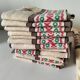 Nappe et 12 serviettes de style basque monogrammées MB