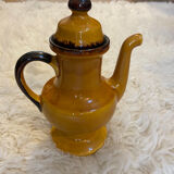 Teapot in yellow ceramic with the logo