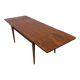 Scandinavian extendable dining table in teak, circa 1960.