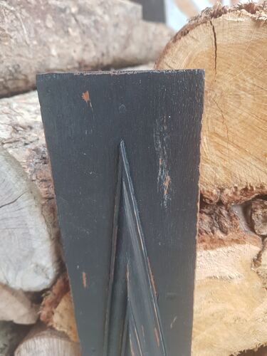 Black patinated rectangle woodwork