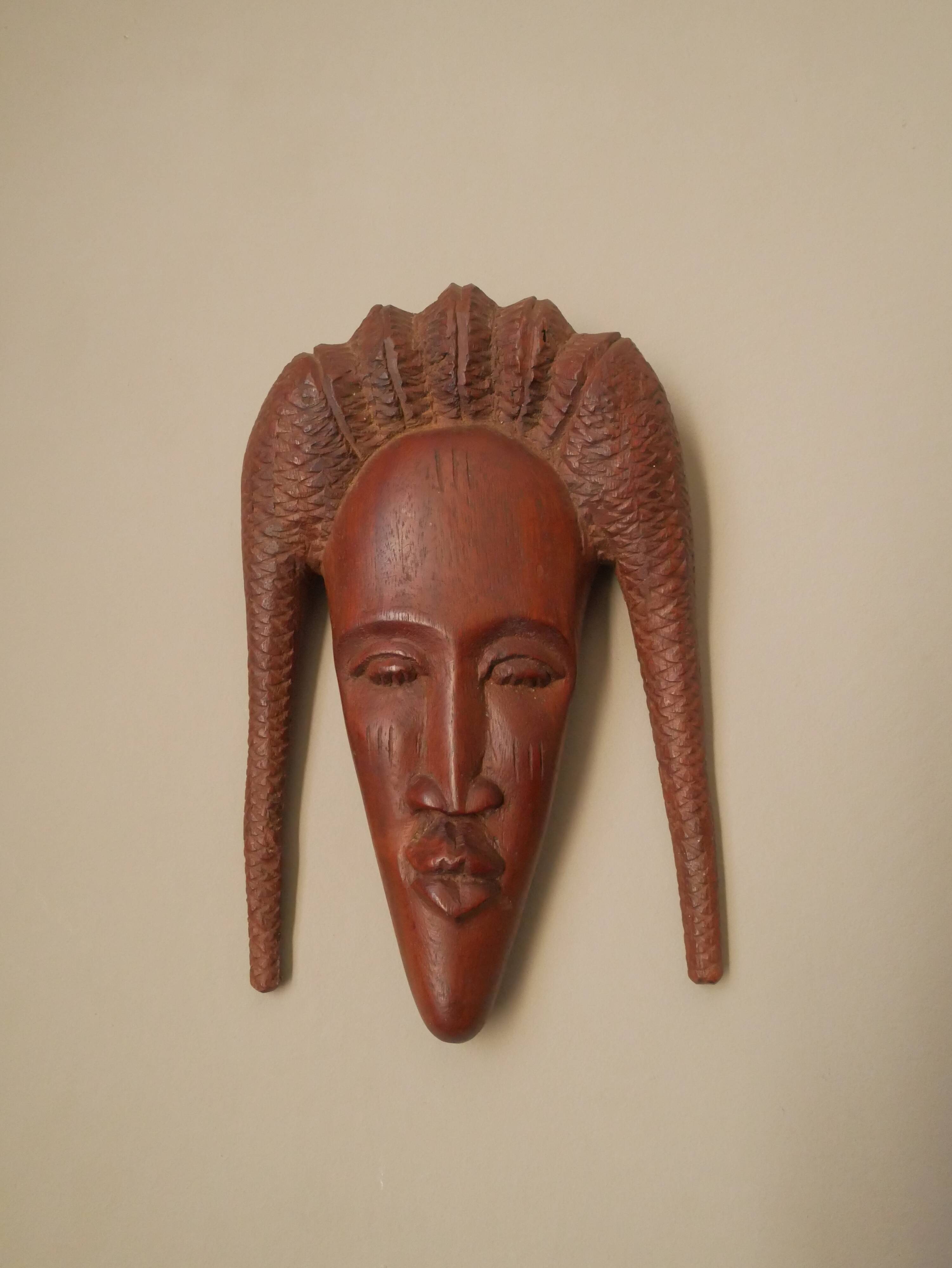 Carved wooden mask African art woman face handcrafted tribal ethnic decoration