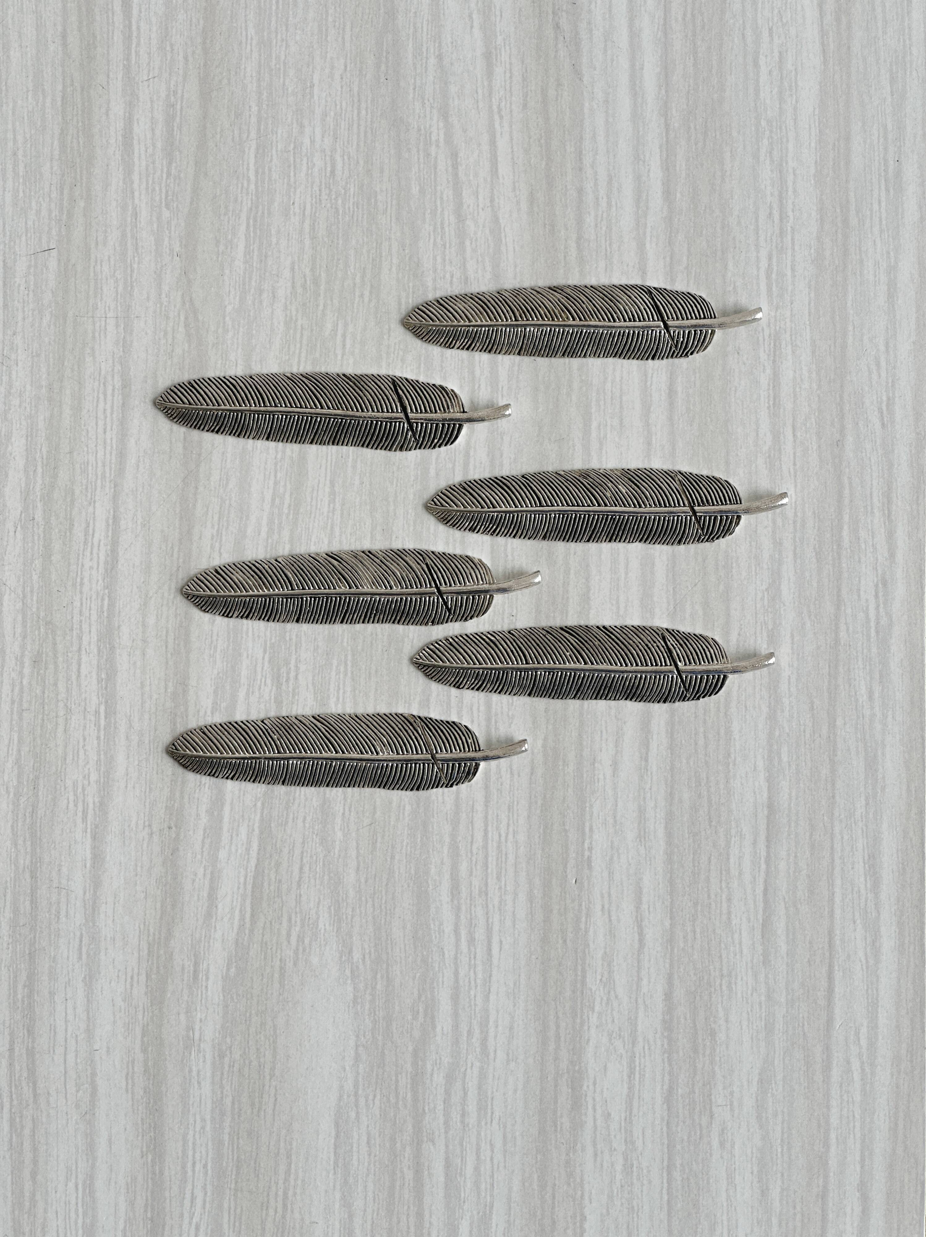 Set of 6 metal knife rests, name holders.