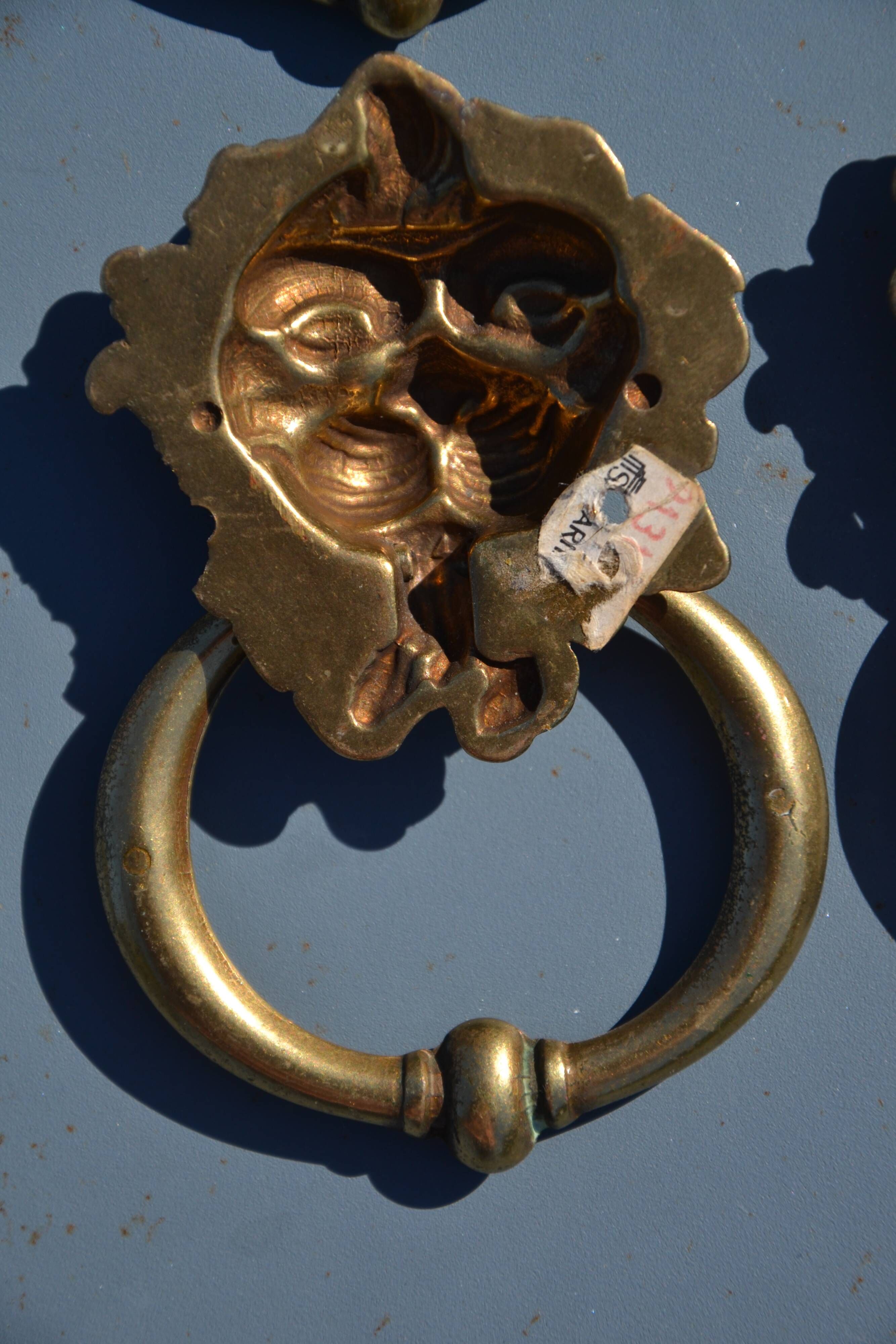 4 antique lion head furniture handles from La Samaritaine.