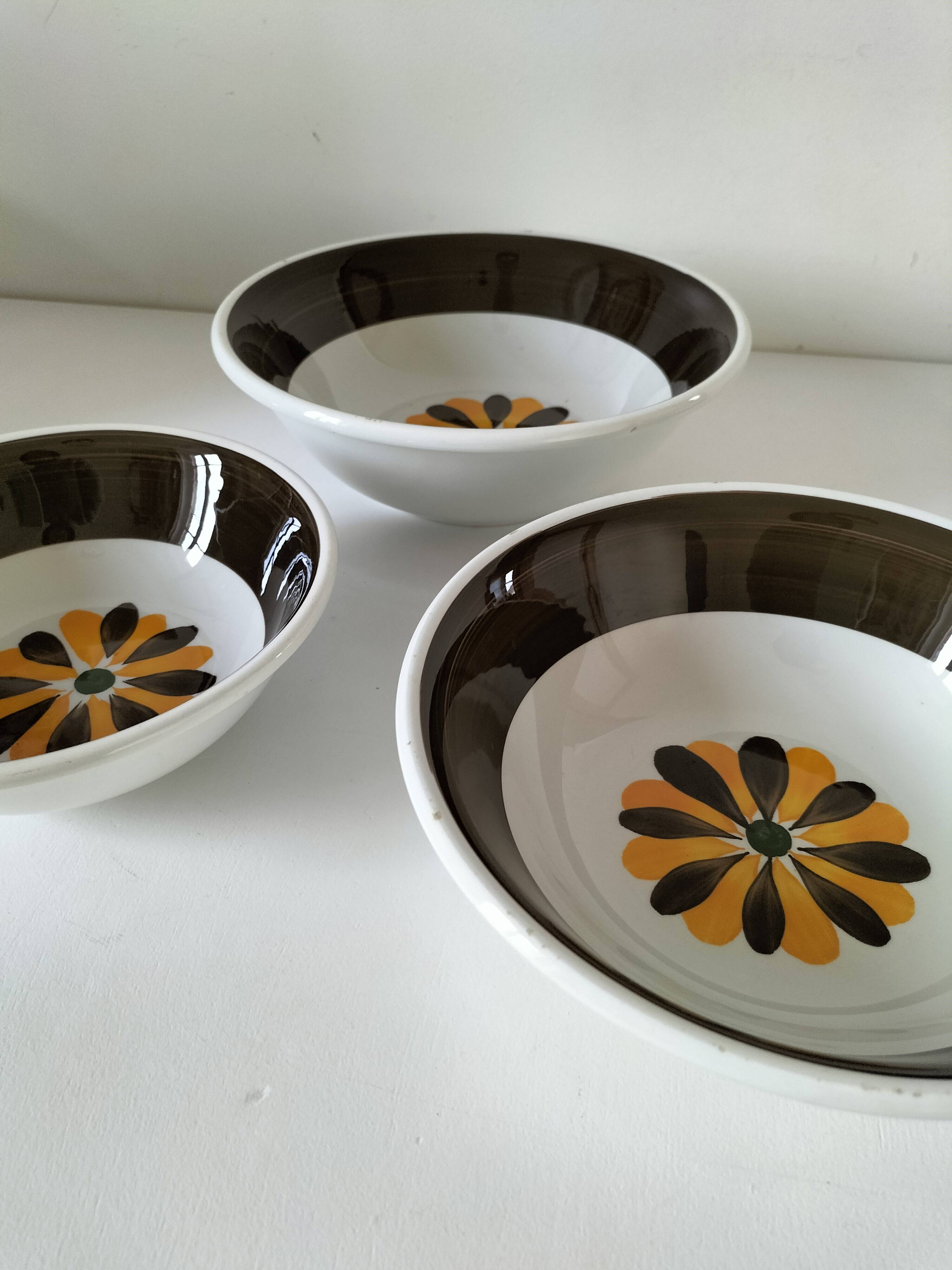 Trio of Italian 1970s deep plates, ochre brown floral decoration