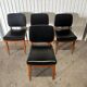 Set of 4 vintage 1960s chairs in wood and black faux leather – design