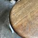 White tubular metal and wood stool