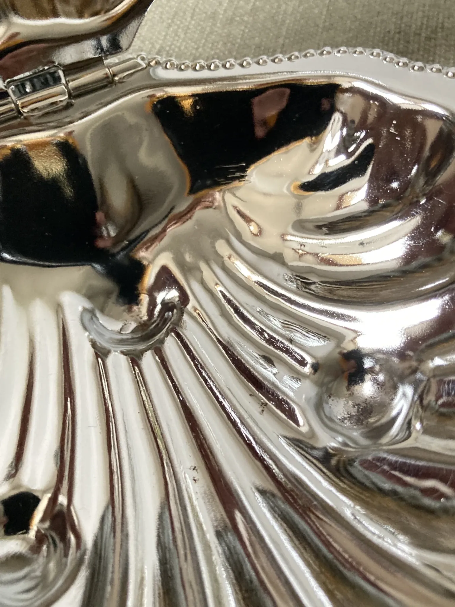 Metal shell butter dish with glass bowl and knife