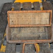 Vintage brown wicker cylindrical basket from the 1940s — long case for a bottle