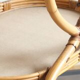 Vintage bamboo and rattan serving trolley on wheels