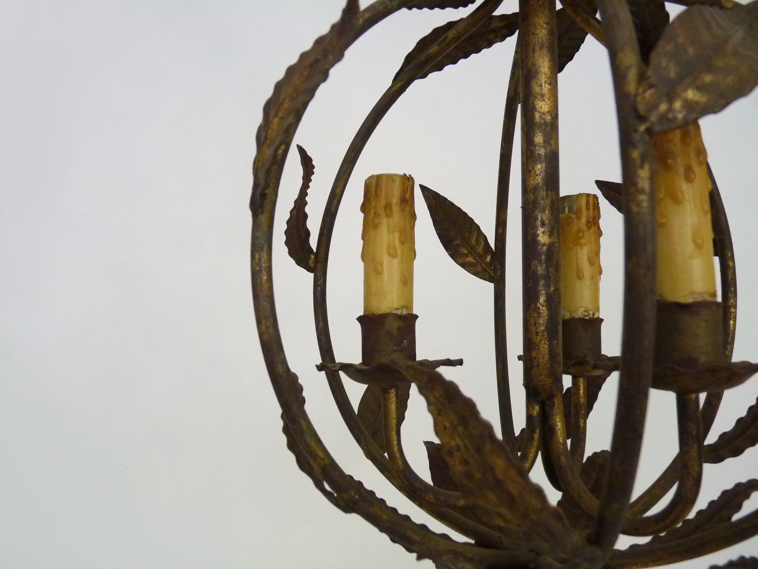 Vintage cage chandelier in aged golden metal and foliage, antique lighting, 3-burner chandelier. Year 60