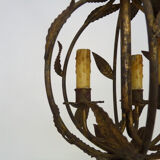 Vintage cage chandelier in aged golden metal and foliage, antique lighting, 3-burner chandelier. Year 60