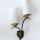 Wall lamp in black metal and gilded brass 1960 with two lights.