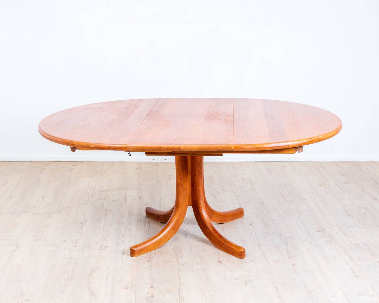 1970s solid teak dining table with Scandinavian design.