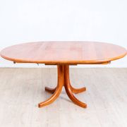 1970s solid teak dining table with Scandinavian design.