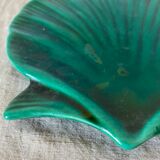 Empty ceramic pocket scallop shell