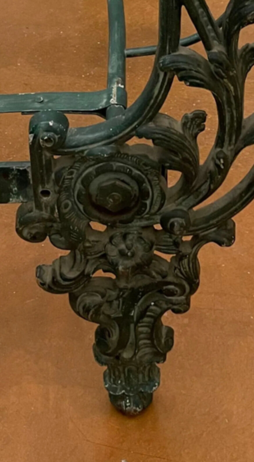 Cast iron bed with floral decorations
