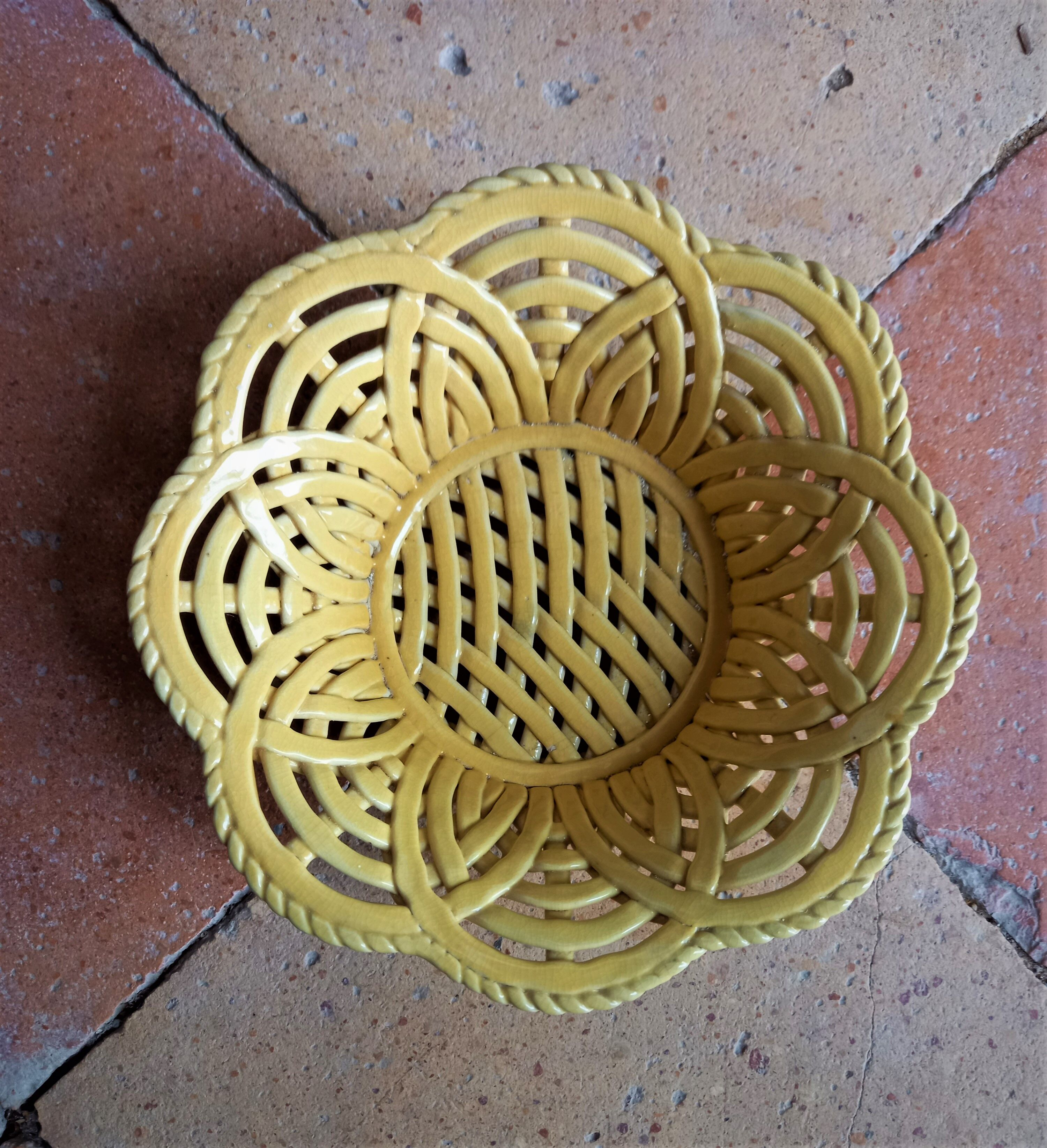 Yellow braided ceramic fruit basket