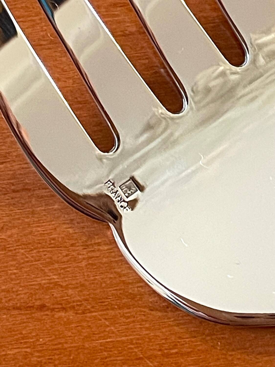 Christofle Aria gold ring serving fork
