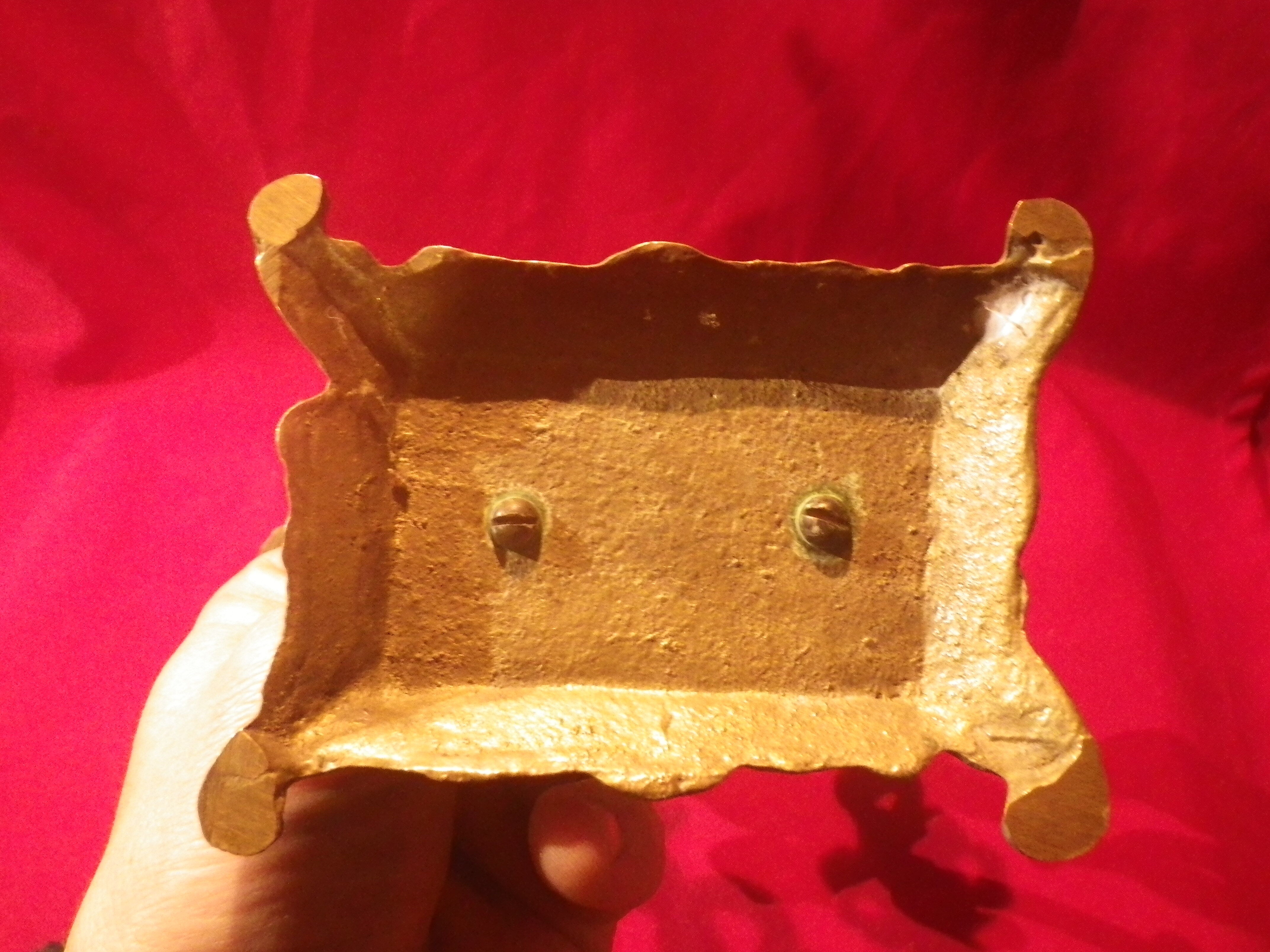 Two brass NCIAN candlesticks