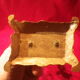 Two brass NCIAN candlesticks