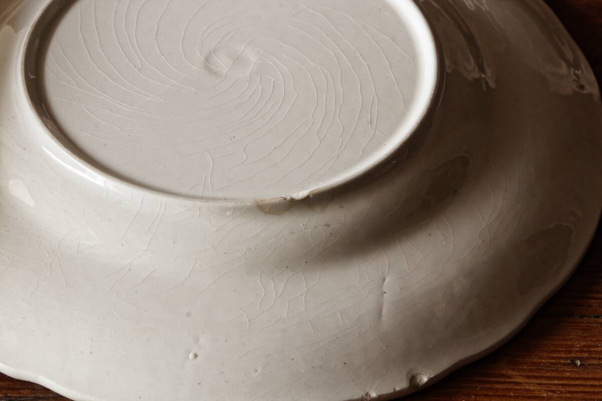 Set of 11 dessert plates in English earthenware.