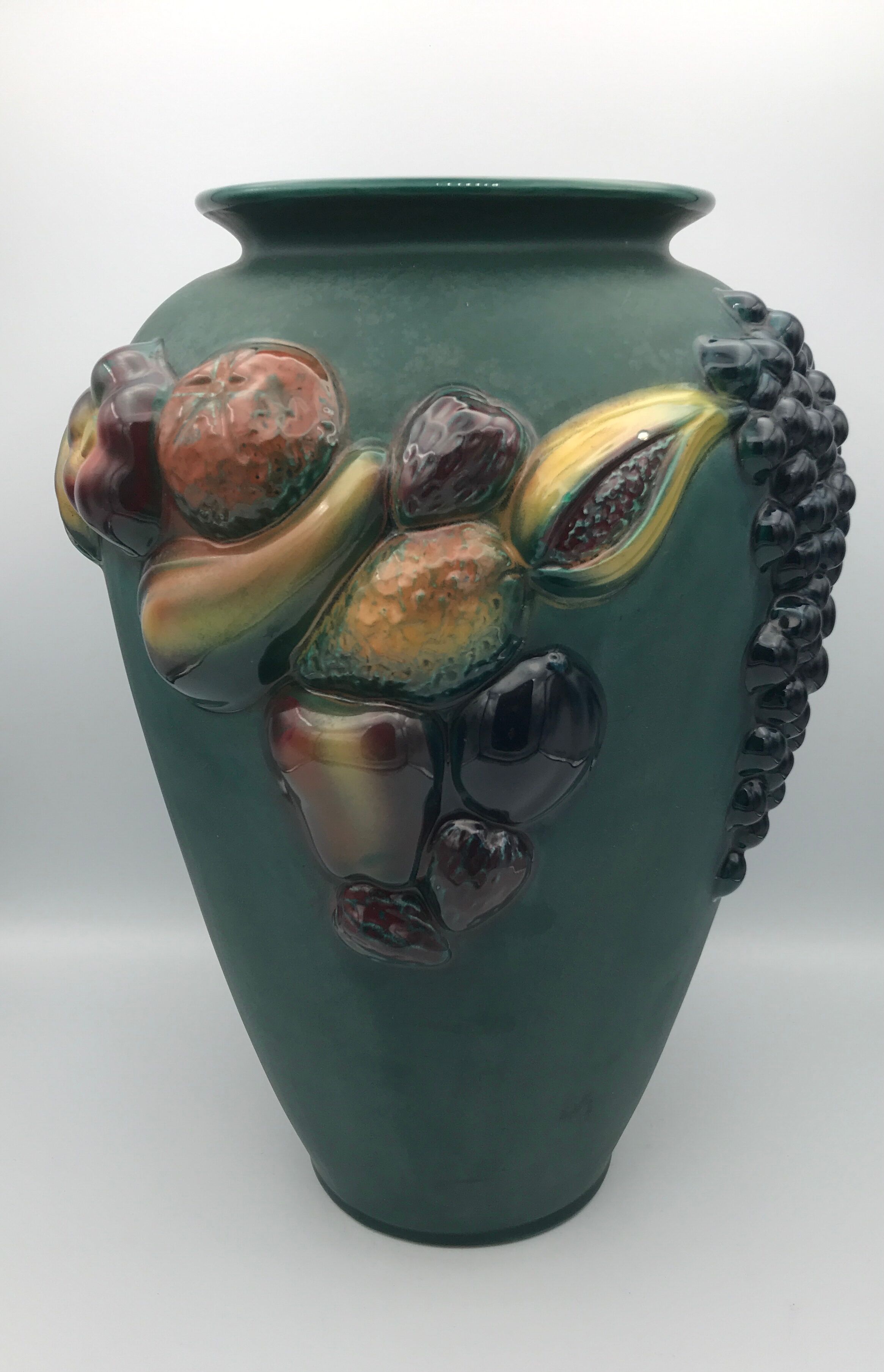 Green ceramic vase with polychrome decoration of fruits and vegetables in relief 33.5 cm