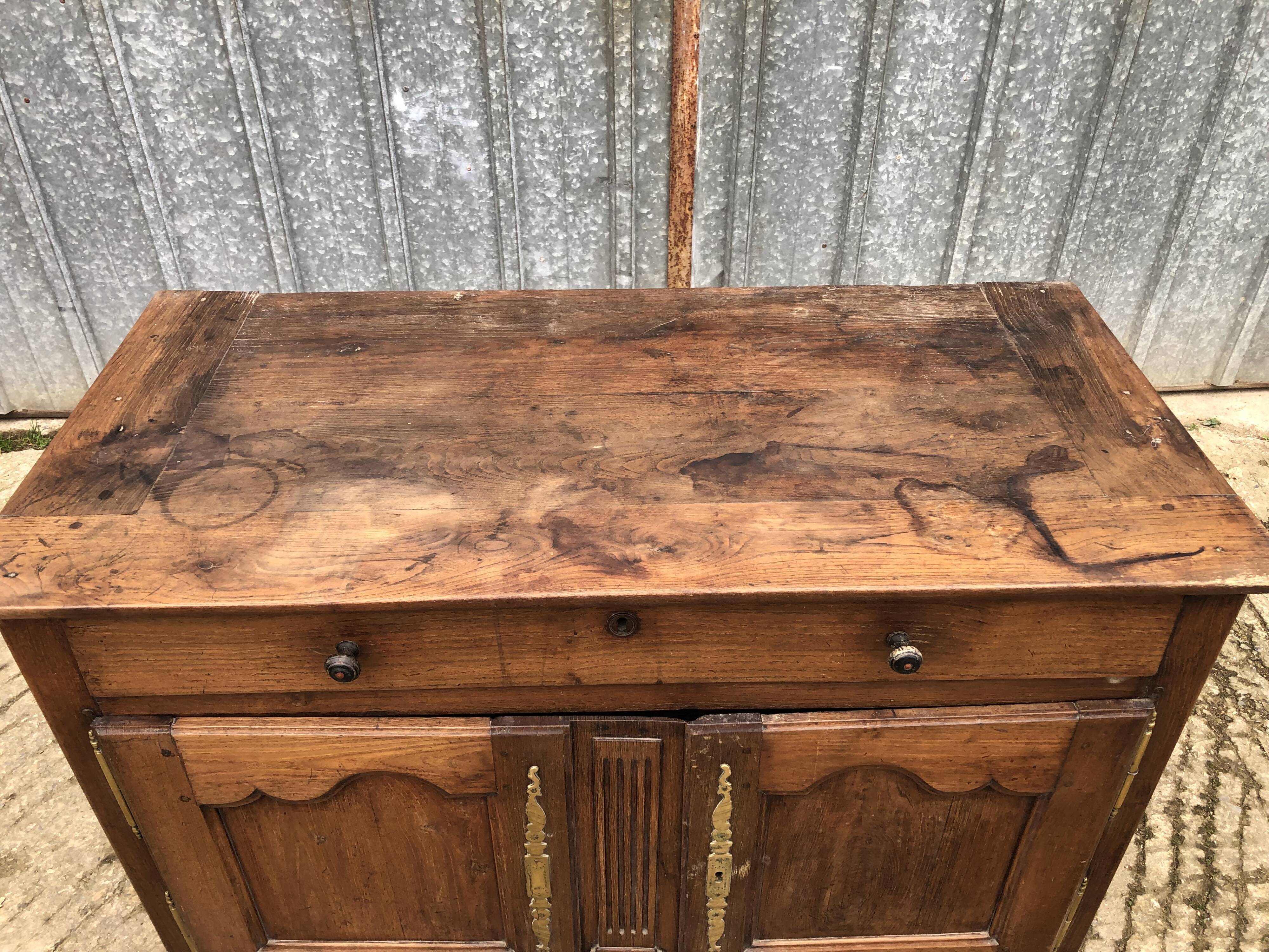 Antique Louis XV low chestnut sideboard with 2 doors and 1 drawer.