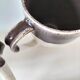 Set of three two-tone mugs, glazed stoneware, café workshop style.