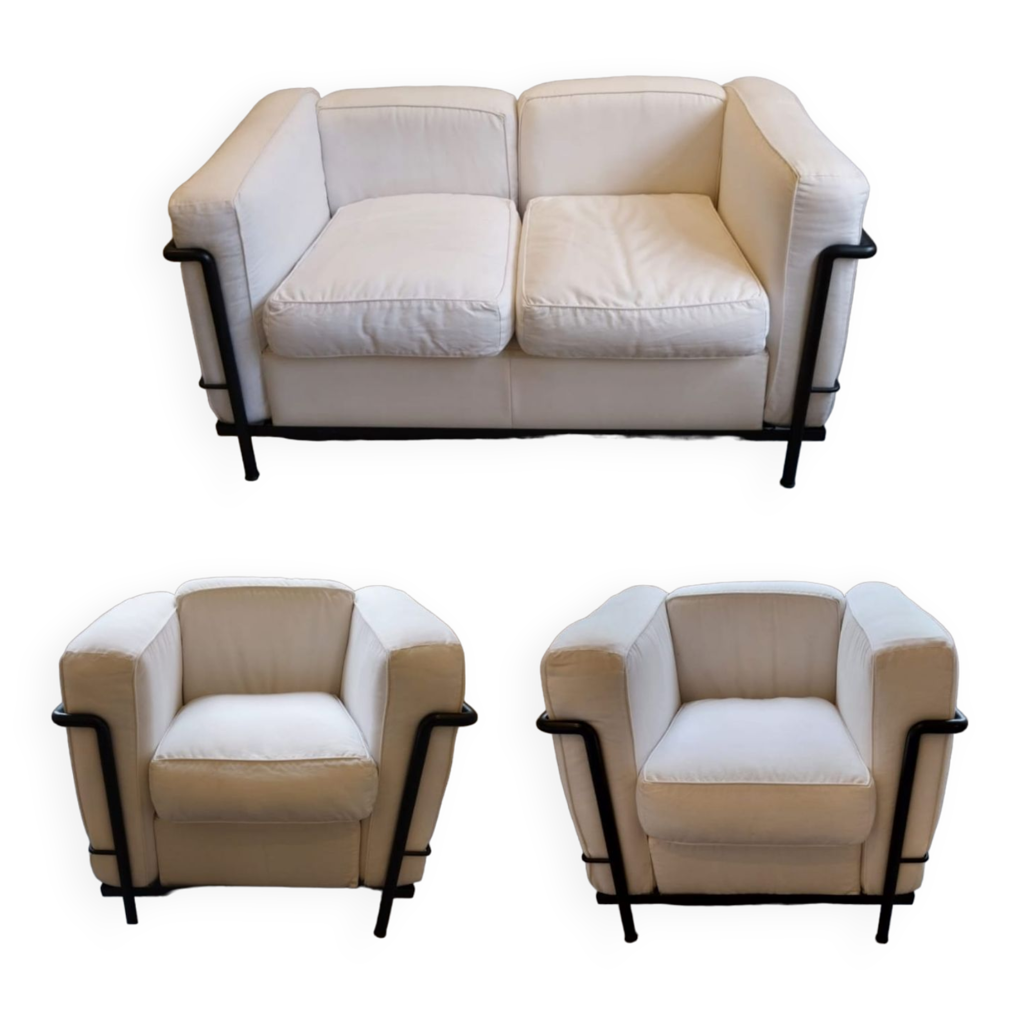 A sofa and two LC2 Cassina armchairs
