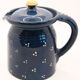 Pitcher and navy blue lid with off-white peas