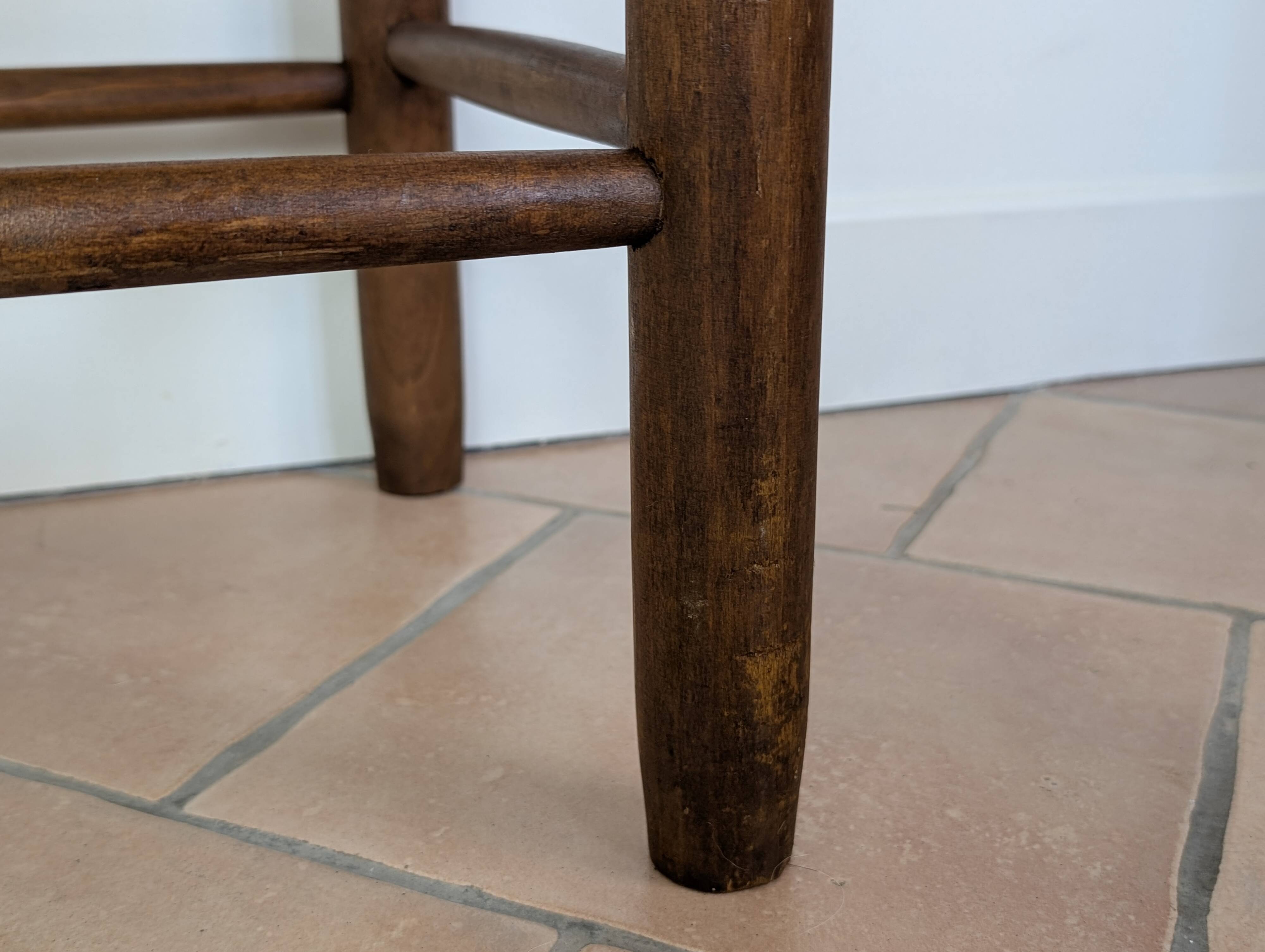 High wooden and straw stools