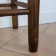 High wooden and straw stools
