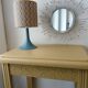 Vitamin yellow art deco console