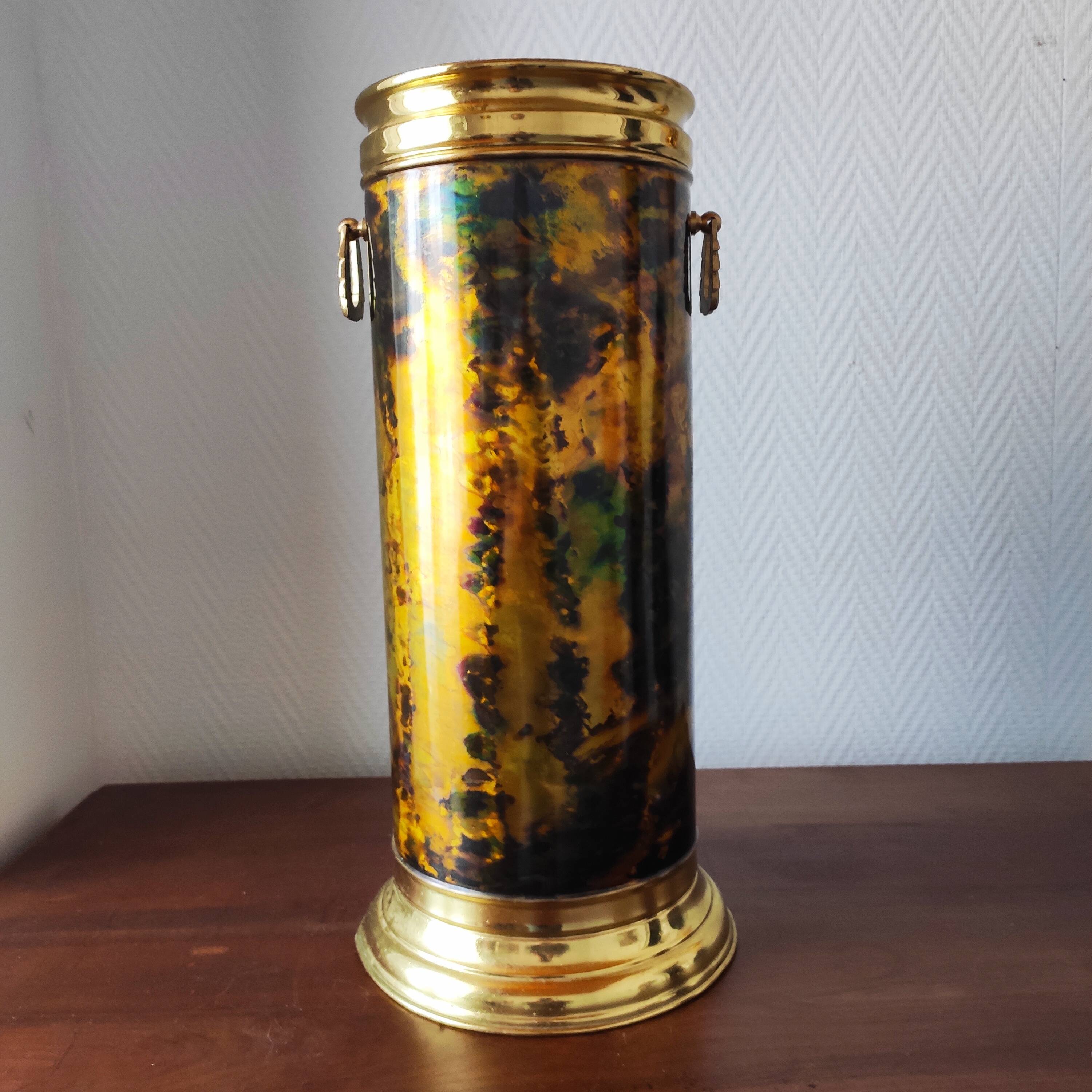 Flame-patterned golden umbrella stand