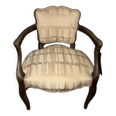 Fauteuil de style Louis XV en bois