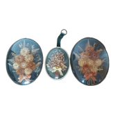 3 frames of dried flowers in curved glass